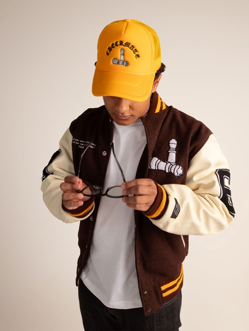 CheckmatexDelvon Jae Varsity Jacket in Black & White