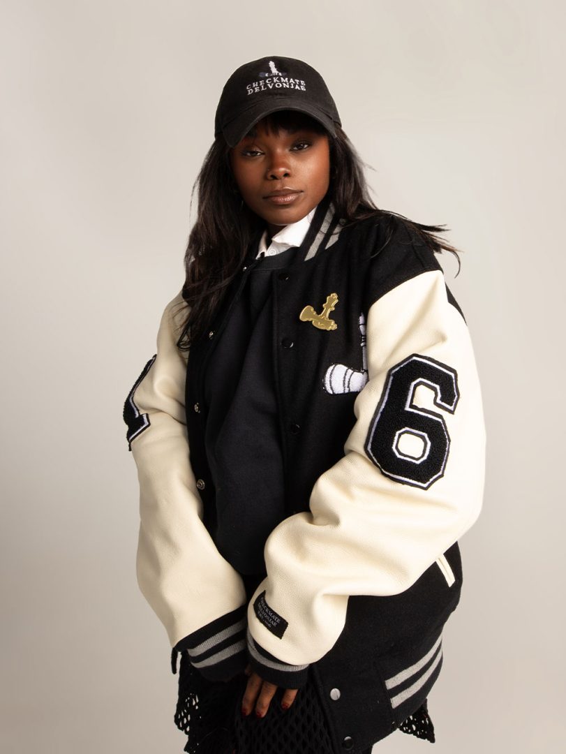 CheckmatexDelvon Jae Varsity Jacket in Black & White