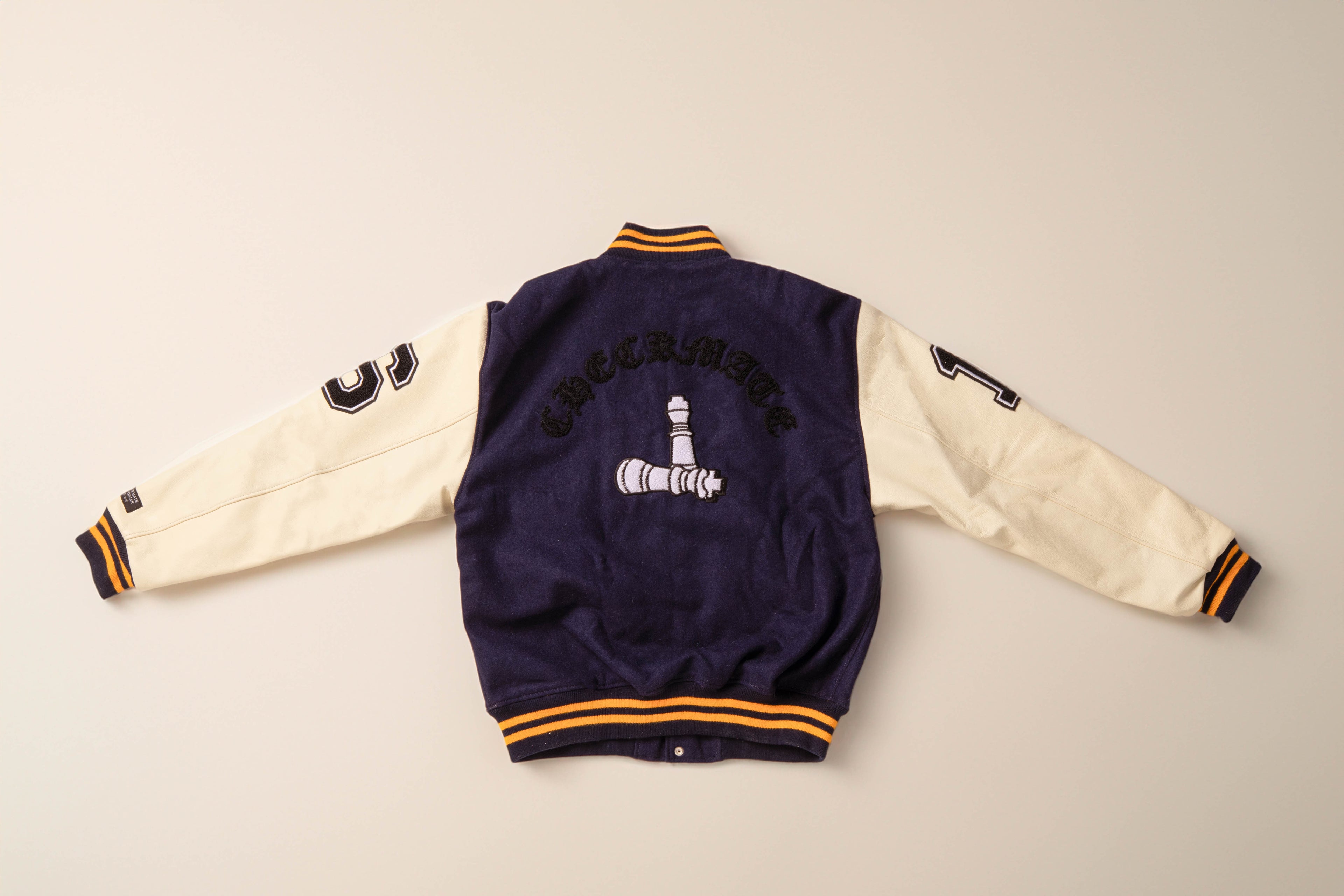 CheckmatexDelvon Jae Varsity Jacket in Navy Blue