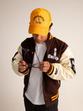 Checkmate Anywear Varsity Jacket in Brown & Yellow