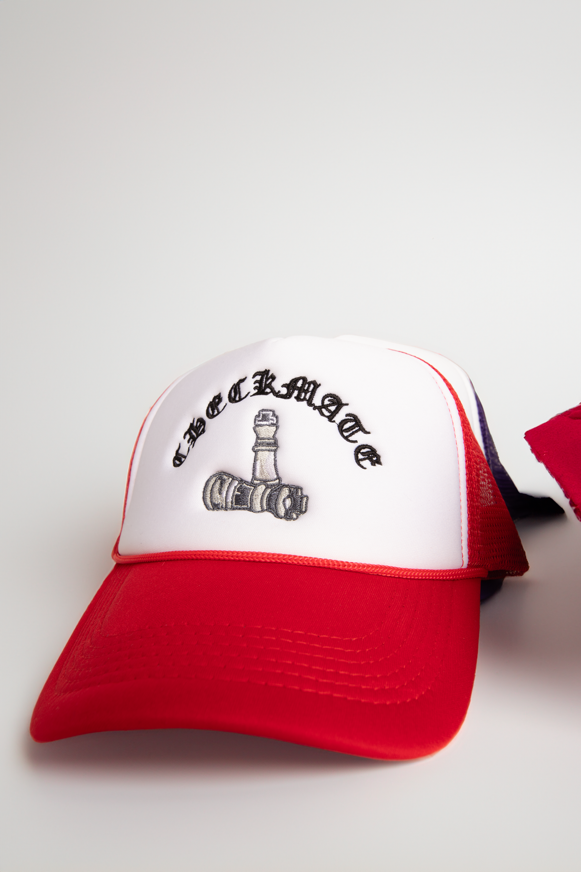 Checkmate Anywear Trucker in Black & White Embroidery - OS
