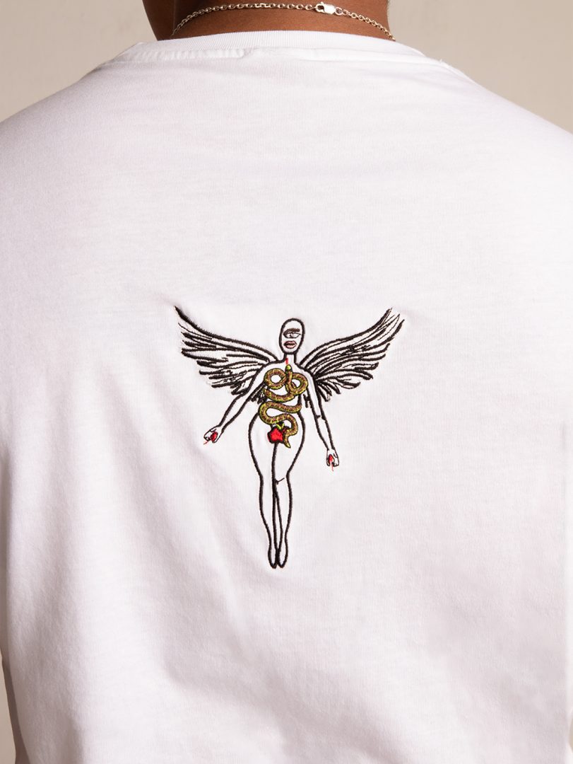 Backside of Checkmate Anywear Embroidered Angel Jersey Cotton T-shirt in White