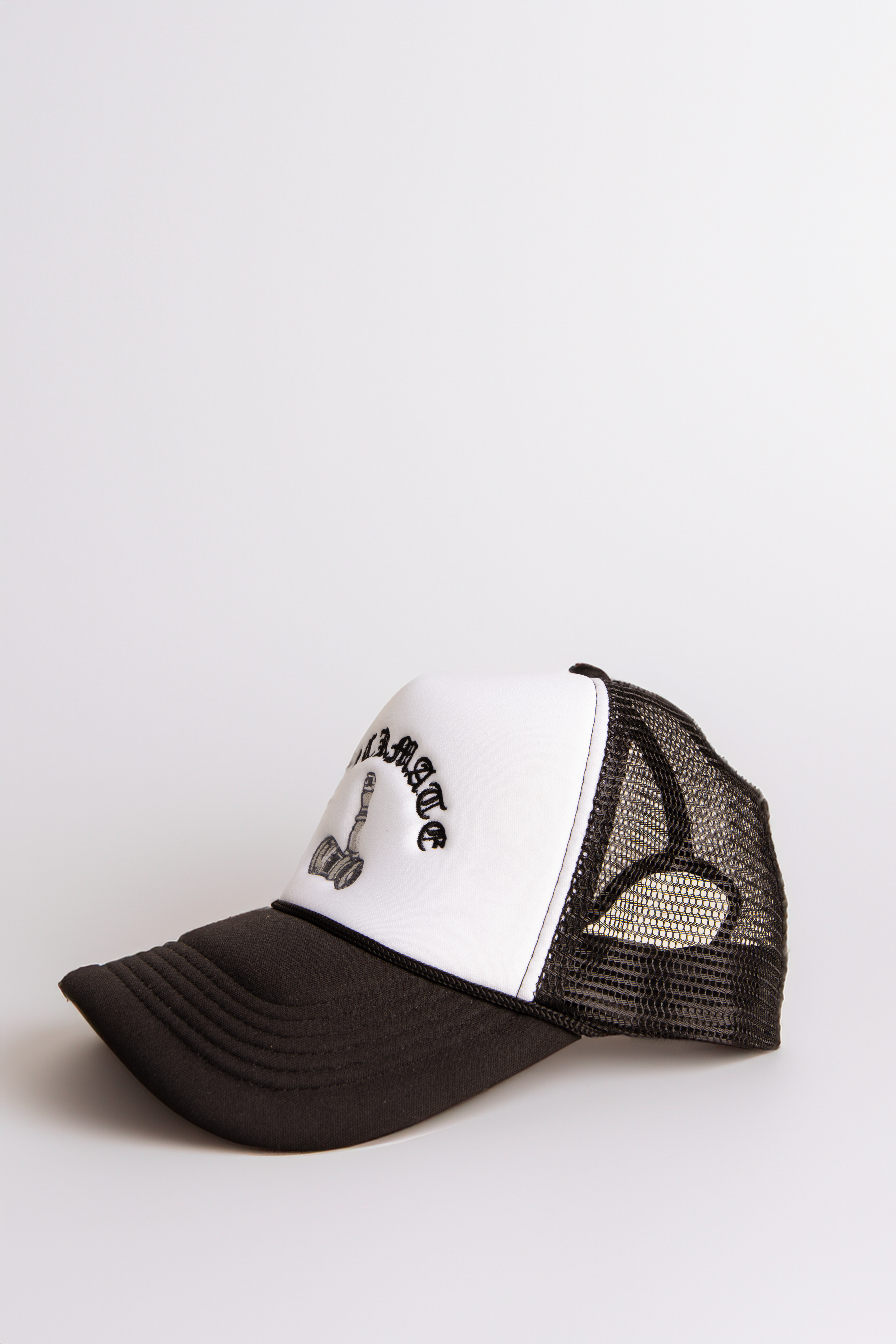 Checkmate Anywear Trucker in Black & White Embroidery - OS