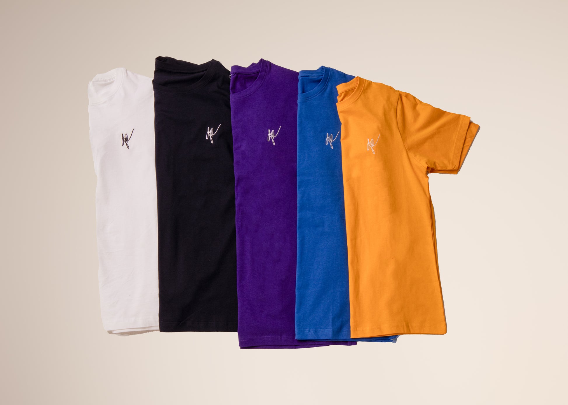 Checkmate Anywear Embroidered Signature Jersey Cotton T-shirt in Bright Blue