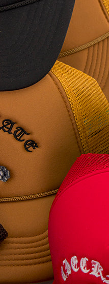 Checkmate Anywear Trucker in Gold with Black Embroidery - OS