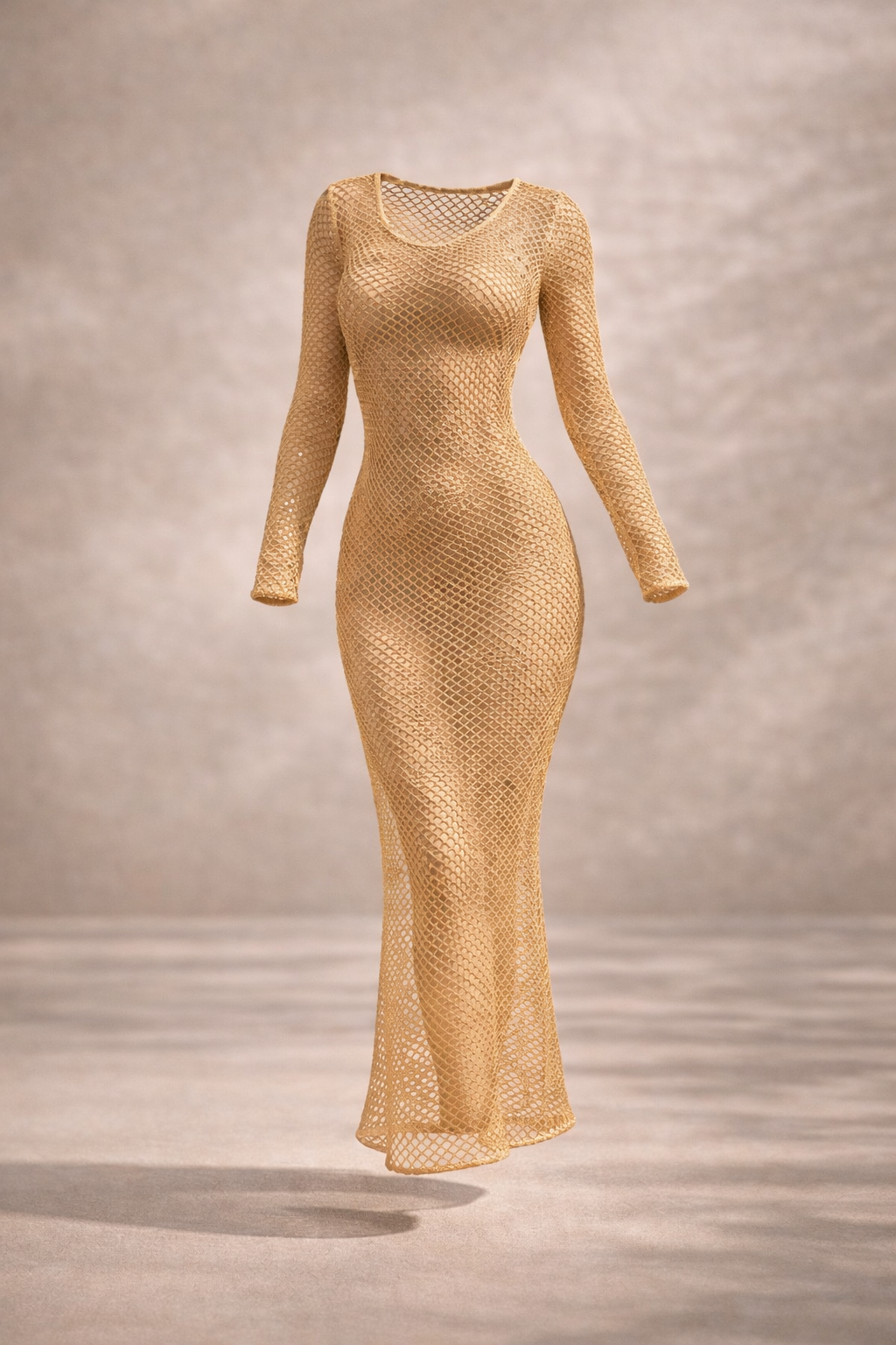 Gold mesh dress on a neutral background