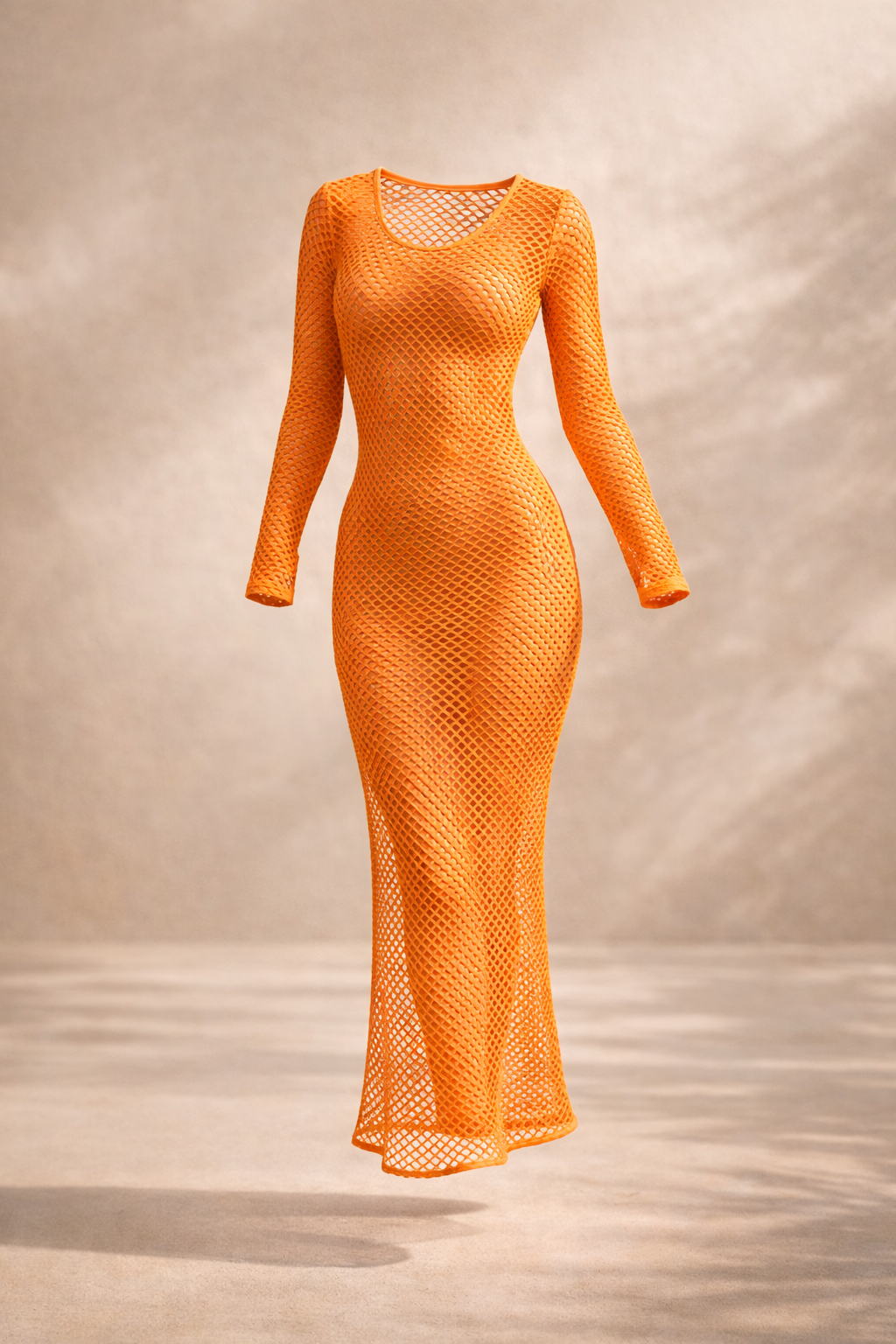 Orange mesh dress on a neutral background
